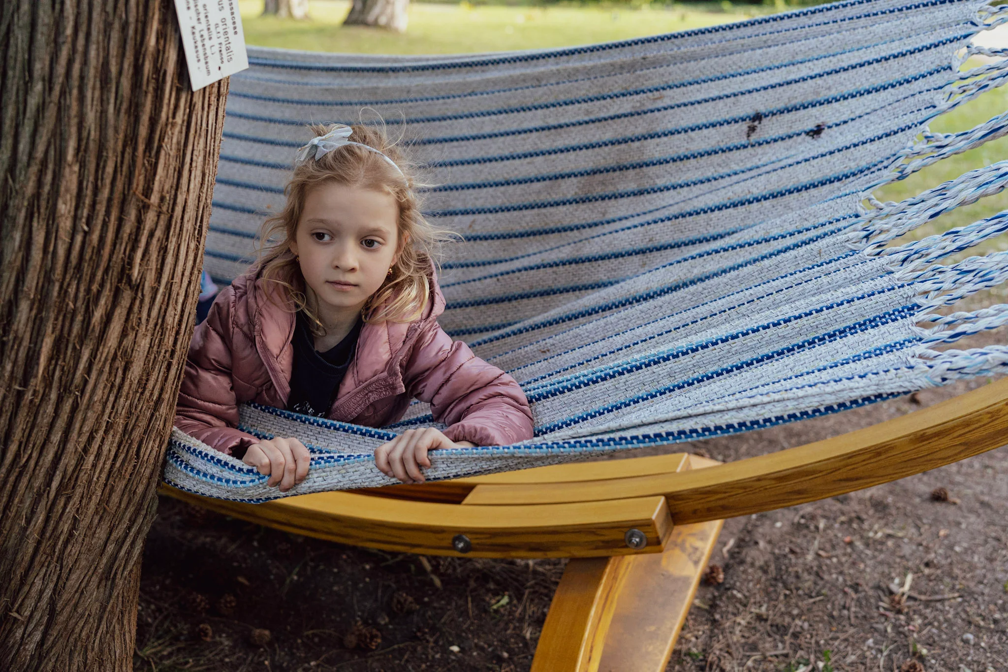 Little girl in a hammock at the Belvedere Botanical Garden.