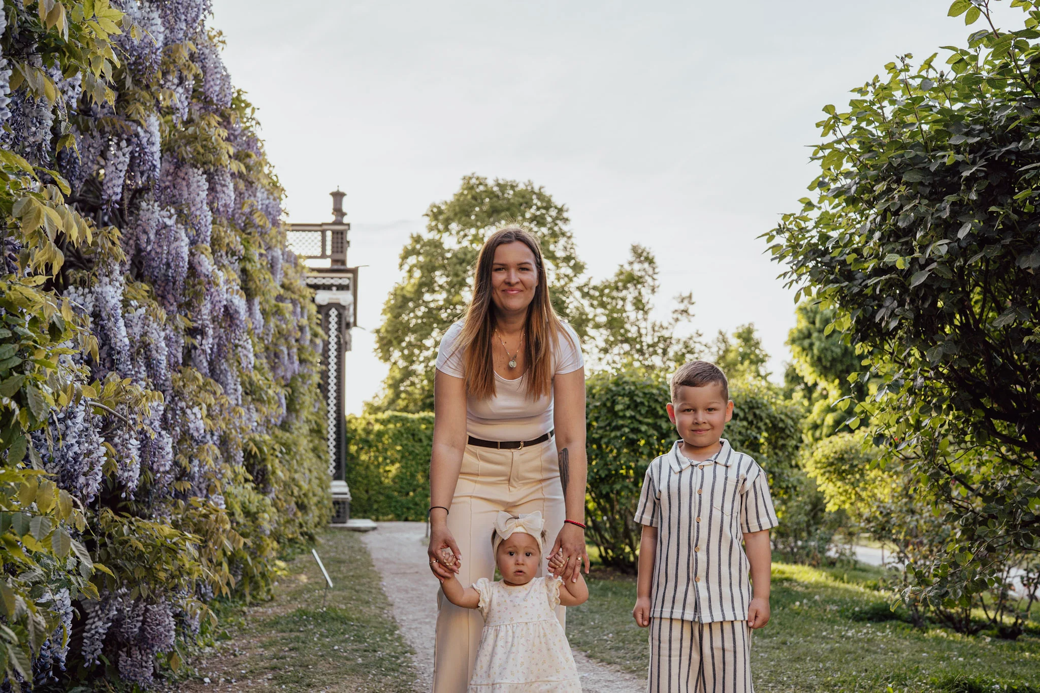 Mother with her children in the gardens of Schönbrunn Palace.